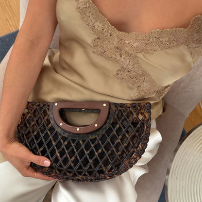 Dolce Vita HANDBAGS Solandra Tortoise Jelly Clutch